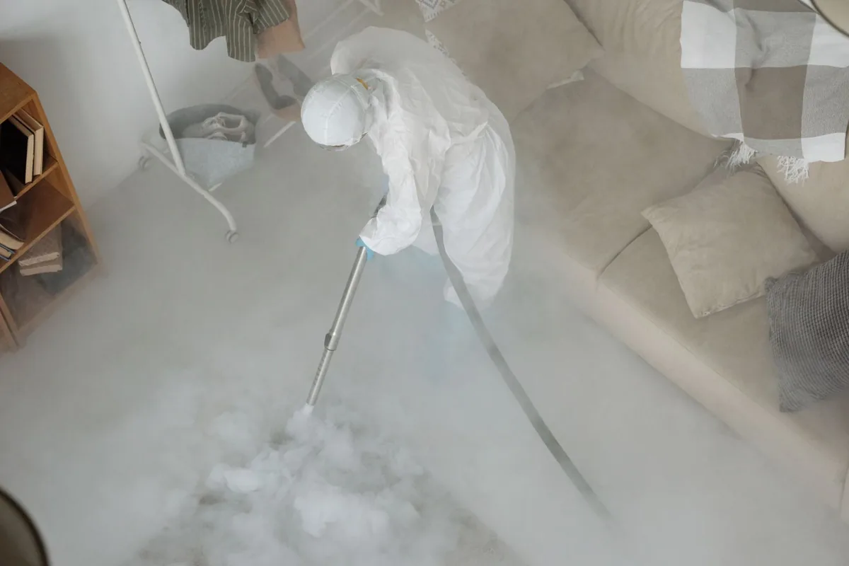 Biohazard cleanup technician in protective equipment, Venice, FL